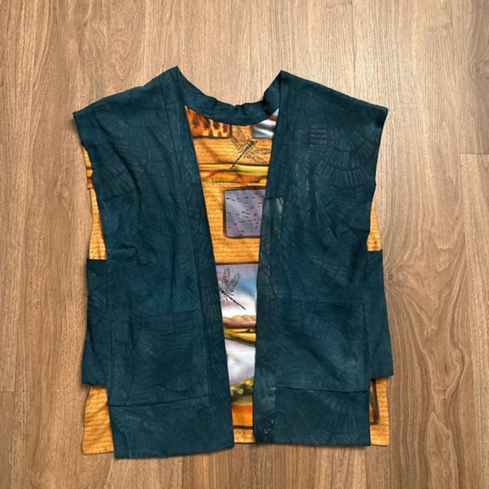 Vintage 1970s teal textured suede vest with printed lining
